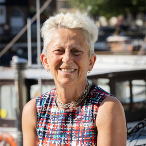 woman standing at a dock