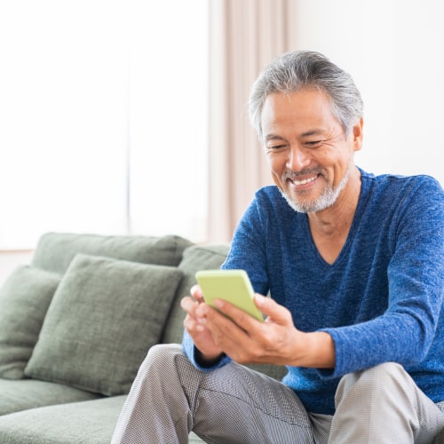 Retired employee using mobile device