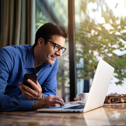 Man sittting down at computer