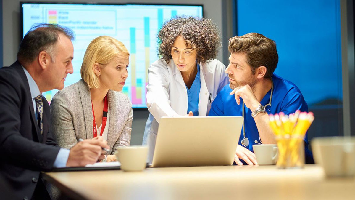 medical panel looking at a computer