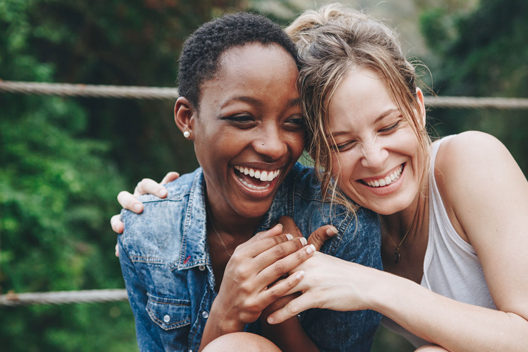 Two women laughing
