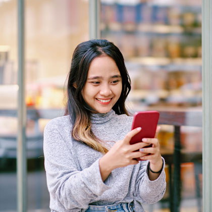 woman looking at phone