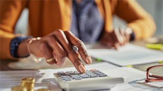 woman using a calculator