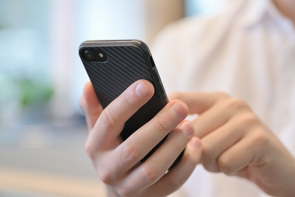 Close up of a person using a smart phone