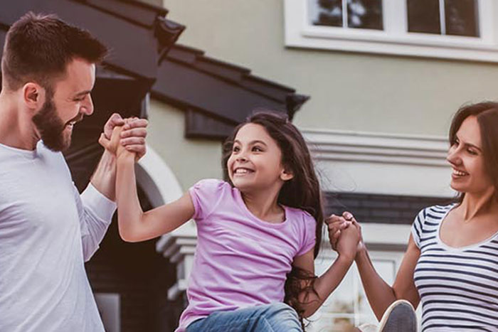 a family spending time together outside their home