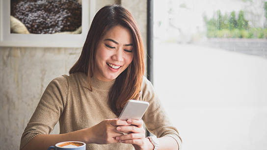 Businesswomen using smartphone