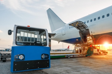 Airplane with cargo being loaded